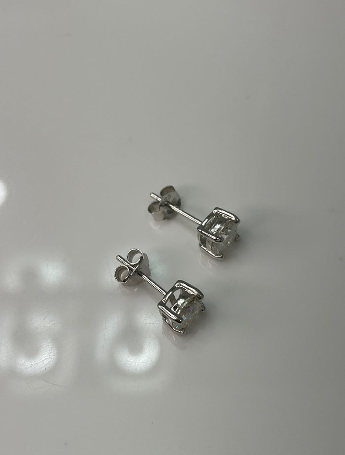 Moissanite stud earrings.