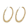 Gold-tone nugget texture hoop earrings with hinged stud posts, pair