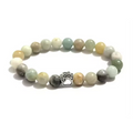 Pastel beaded bracelet with silver paw charm and round bead strands