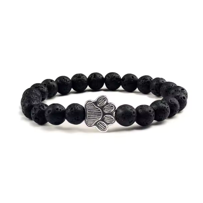Black beaded charm bracelet with silver paw print centerpiece