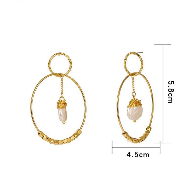 Gold double hoop earrings with pearl drop charms and braided texture on the hoops.