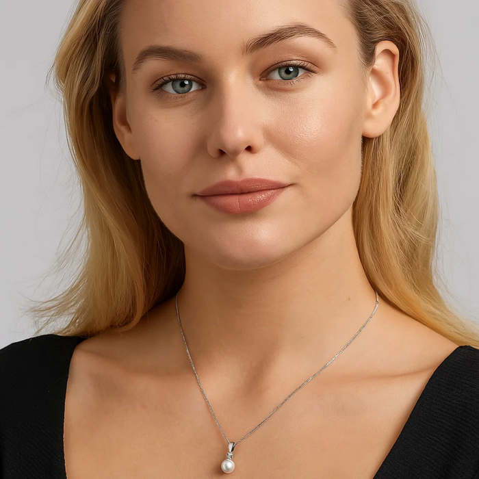 Silver pearl pendant necklace with round pearl charm on fine chain