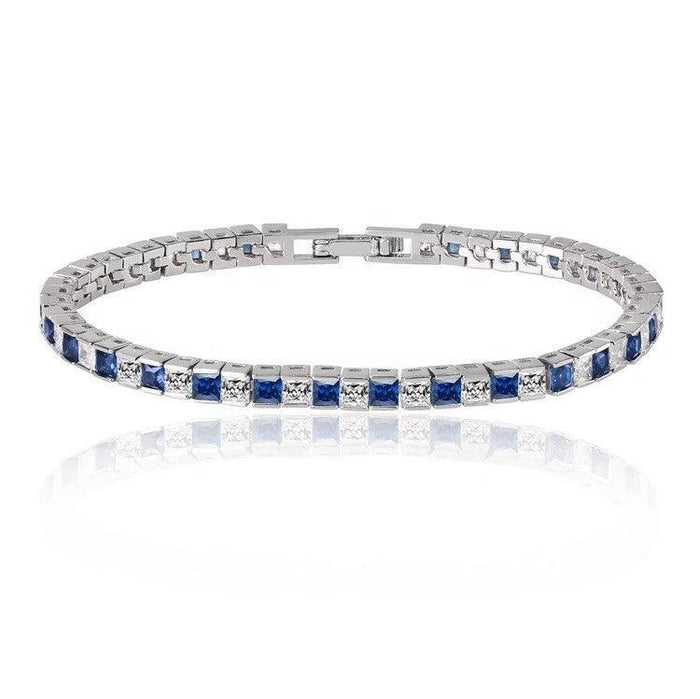 Silver tennis bracelet with princess-cut blue cubic zirconia stones, clasp closure