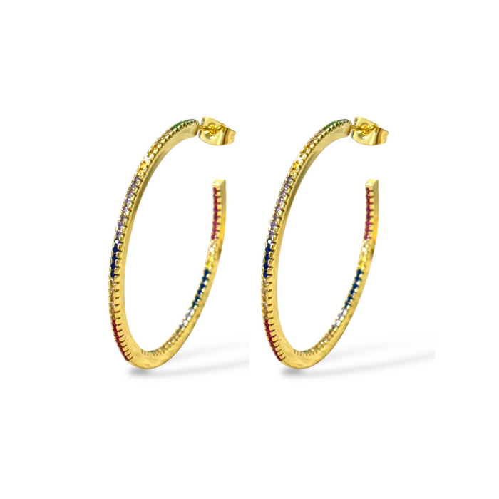 Gold-tone rainbow hoop earrings shown from side angle, multicolor stones