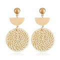 Beige woven rattan hoop drop earrings with half-moon top and gold-tone hooks
