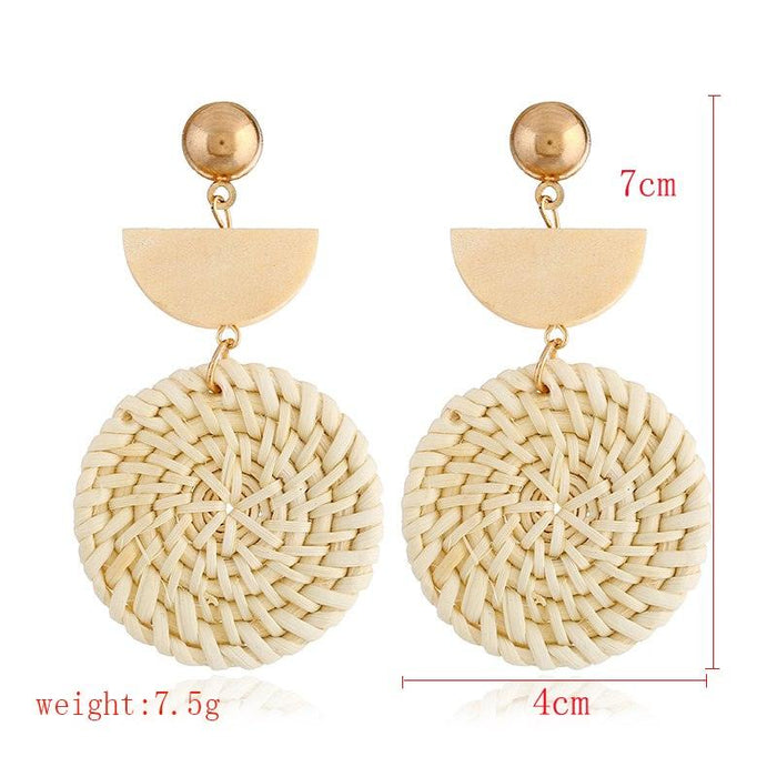 Beige woven rattan half-moon drop earrings, approx 7cm long, gold-tone hooks