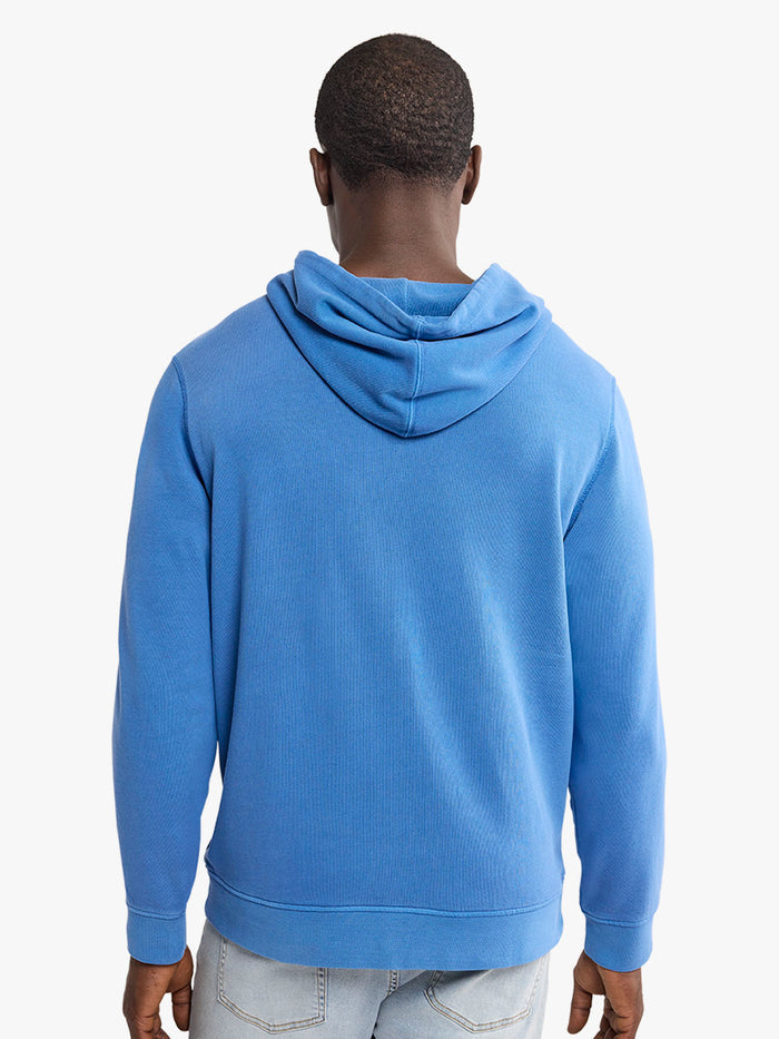 Person wearing a blue hoodie from behind on a white background
