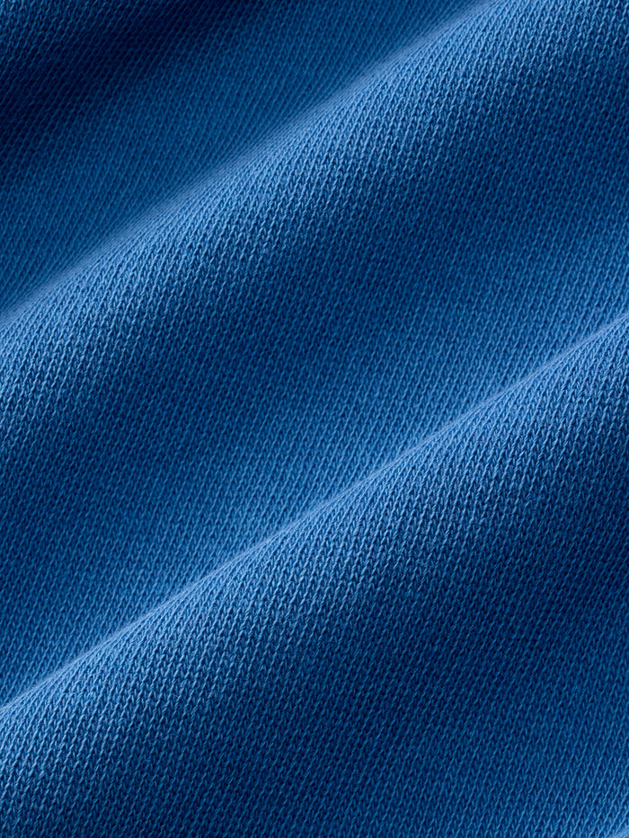 Close-up of blue fabric with visible texture
