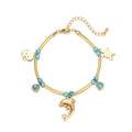 Gold-tone turquoise bead bracelet with dolphin, cat, heart charms and lobster clasp