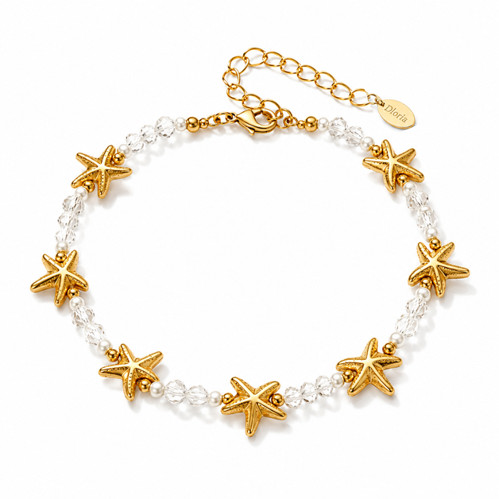 Gold starfish charm bracelet with clear bead links and round extender chain