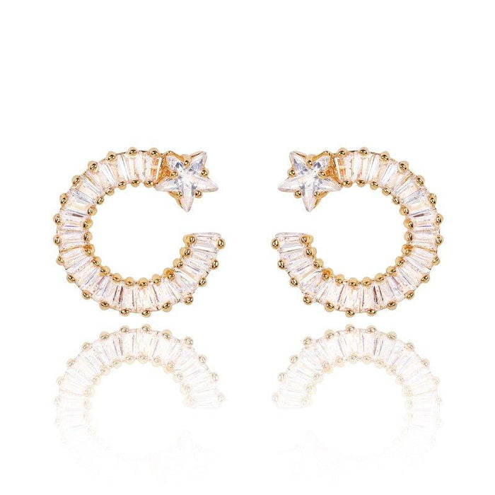 Gold shooting star hoop earrings with clear white cubic zirconia stones