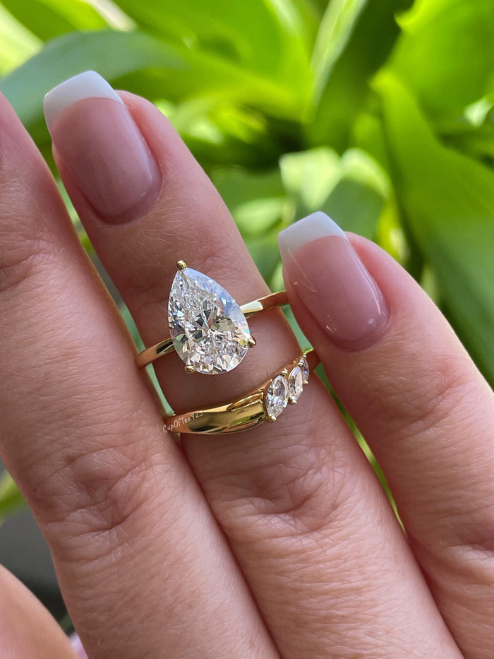 Silver, Yellow gold over sterling silver 925 bridal set with 2CT, 3CT pear cut CZ simulated diamond engagement ring and curved wedding band