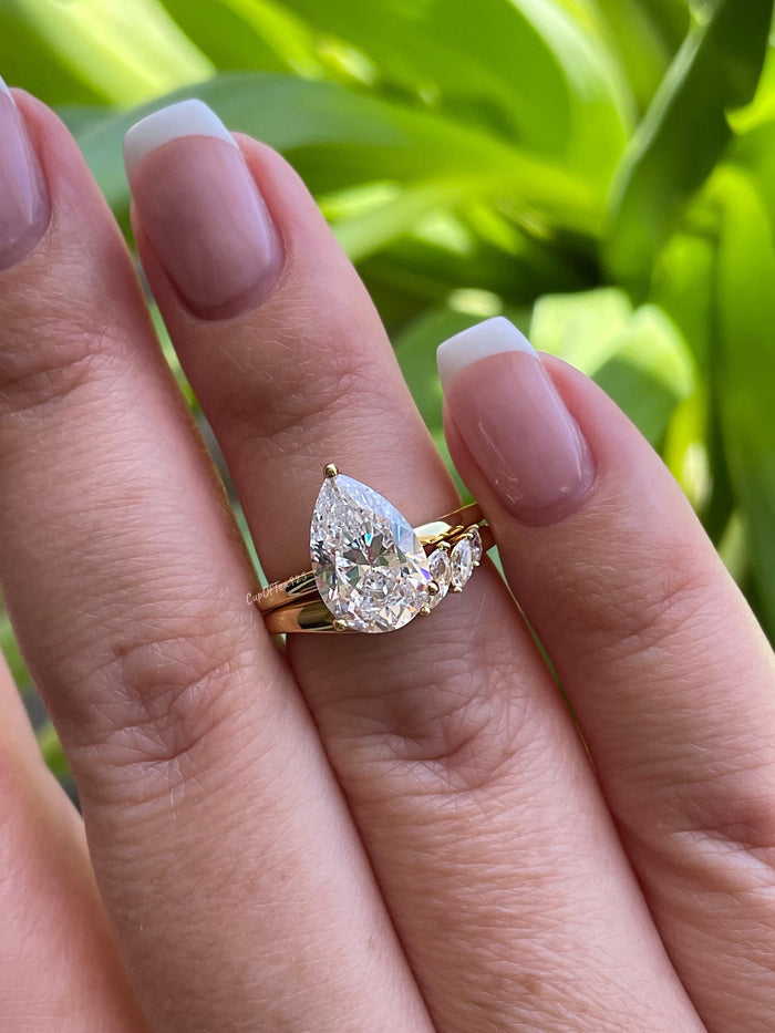 Silver, Yellow gold over sterling silver 925 bridal set with 2CT, 3CT pear cut CZ simulated diamond engagement ring and curved wedding band