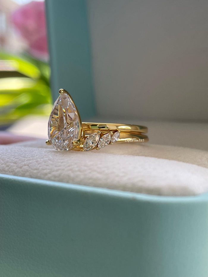 Silver, Yellow gold over sterling silver 925 bridal set with 2CT, 3CT pear cut CZ simulated diamond engagement ring and curved wedding band