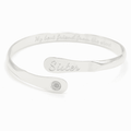Silver sister engraved cuff bracelet with oval plate and small round emblem