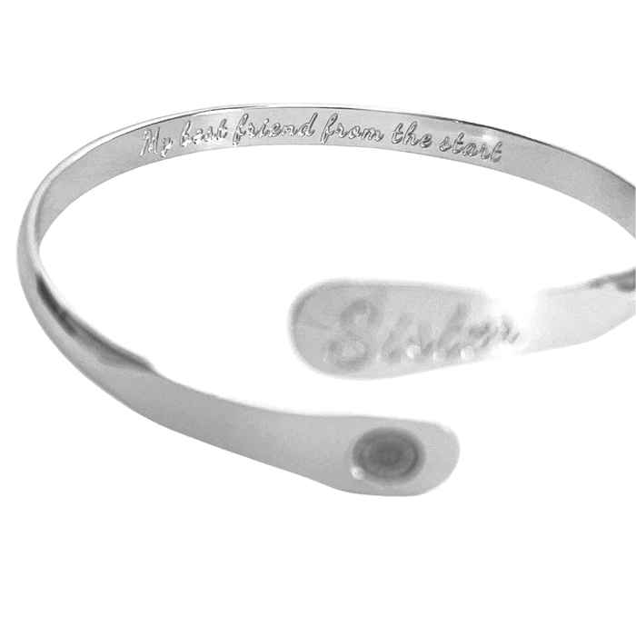 Silver cuff bracelet with engraved inside text and oval centerpiece