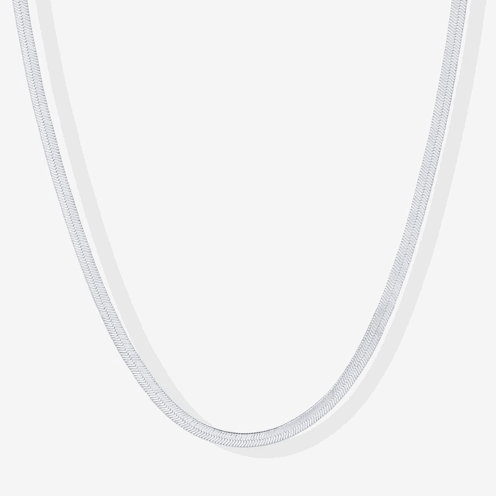 Silver snake chain necklace, close-up of smooth linked links.