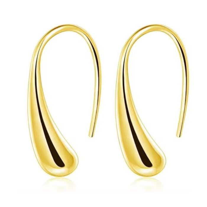 Gold teardrop hook earrings with curved, modern minimal drop shape