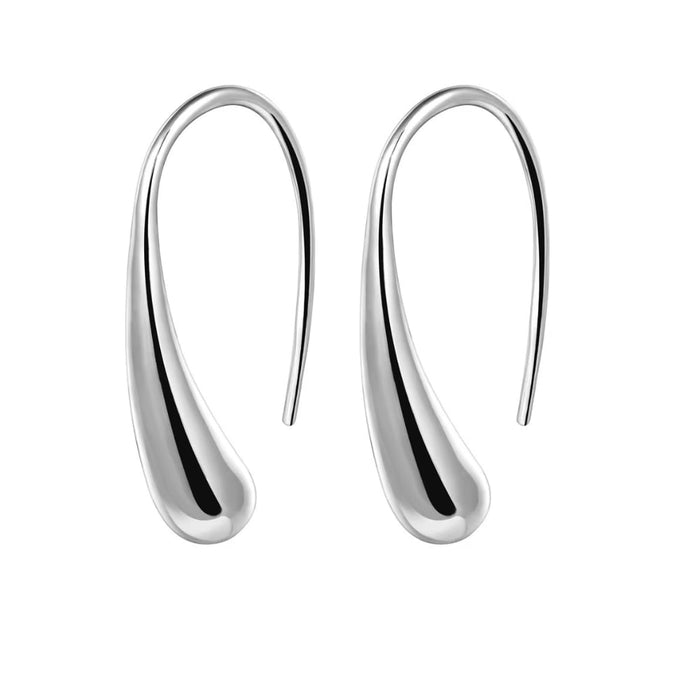 Silver teardrop hook earrings with curved, modern minimal shape