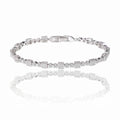 Square tennis bracelet with white cubic zirconia stones and hinged clasp, silver tone
