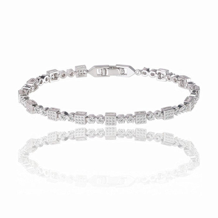 Square tennis bracelet with white cubic zirconia stones and hinged clasp, silver tone