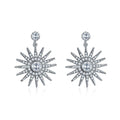 Starburst dangle earrings, silver-tone with white cubic zirconia center and spiked rays