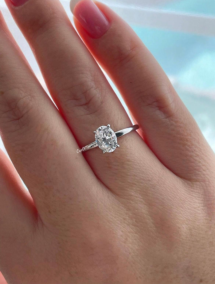 Sterling Silver 925 Bridal set with 1.5CT oval cut CZ simulated diamond solitaire engagement ring and curved moissanite band.