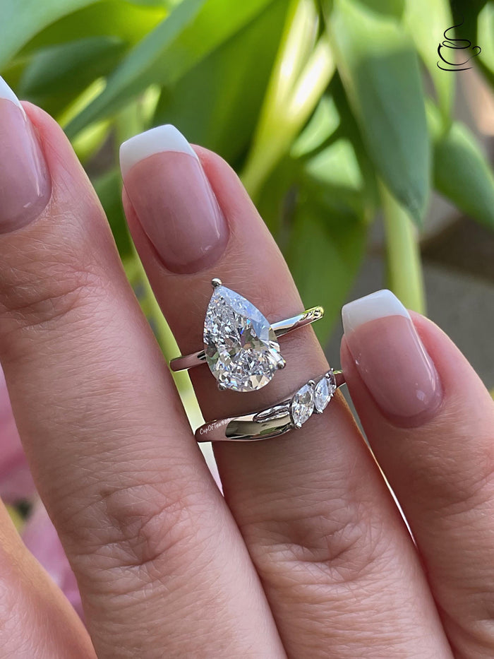 Sterling silver 925 bridal set with 2CT, 3CT pear cut CZ simulated diamond engagement ring and curved wedding band