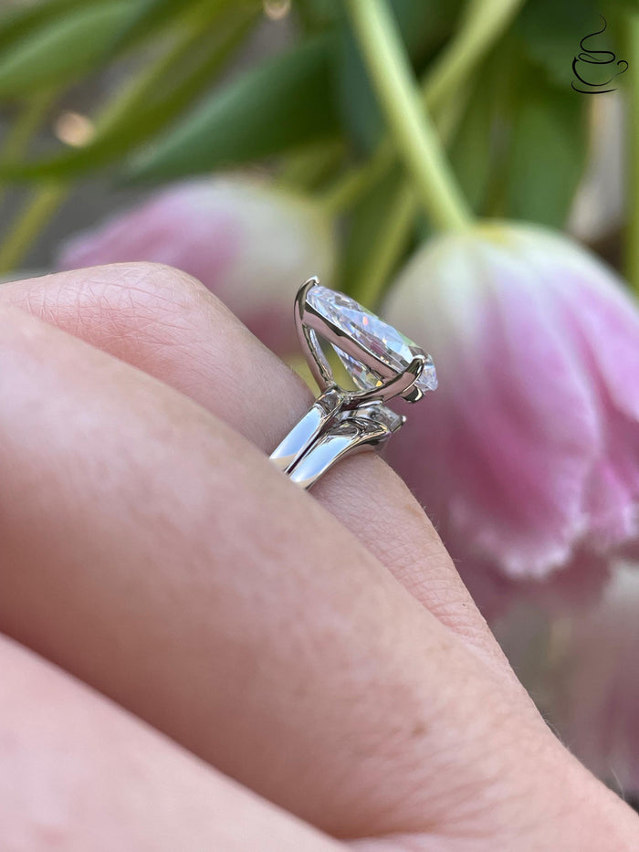 Sterling silver 925 bridal set with 2CT, 3CT pear cut CZ simulated diamond engagement ring and curved wedding band