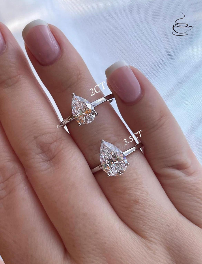 Sterling silver 925 bridal set with 2CT, 3CT pear cut CZ simulated diamond engagement ring and curved wedding band