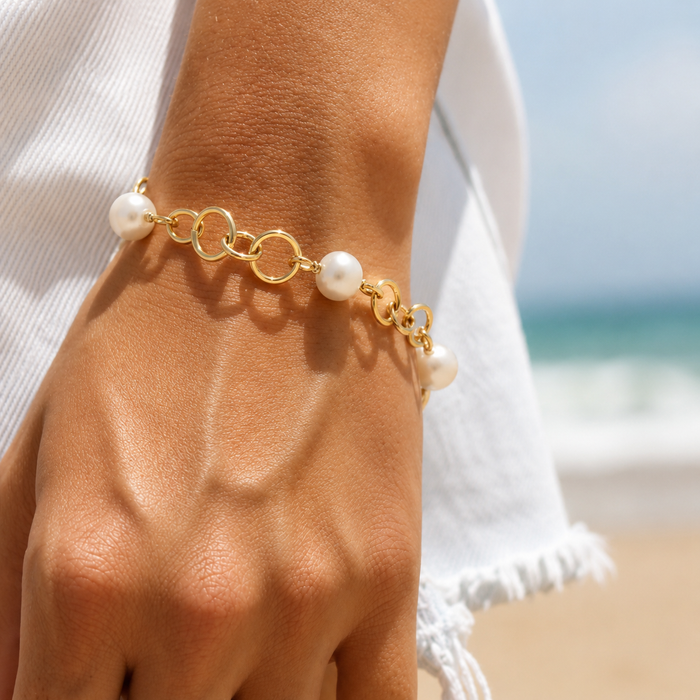 Sunset Beach Pearl Bracelet Gold crafted with genuine freshwater pearls and premium gold vermeil chain links in a coastal-inspired Australian jewellery design.