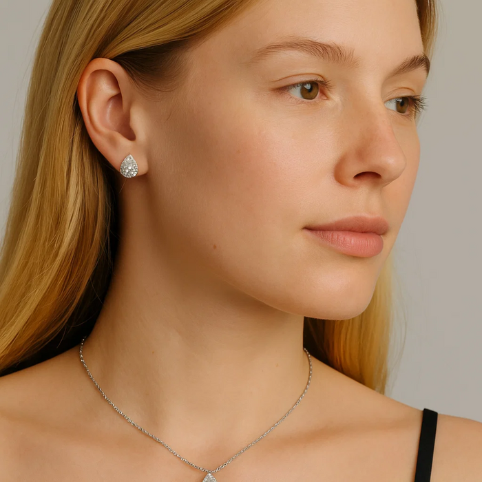 Silver-tone teardrop crystal stud earring and matching necklace chain