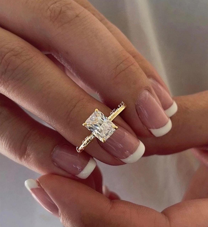 The Alessandra. 18K Yellow Gold Over Sterling Silver 925 Engagement Ring with the finest 2CT Radiant cut simulated diamond.
