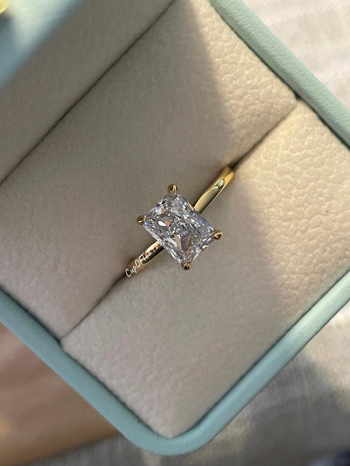 The Alessandra. 18K Yellow Gold Over Sterling Silver 925 Engagement Ring with the finest 2CT Radiant cut simulated diamond.