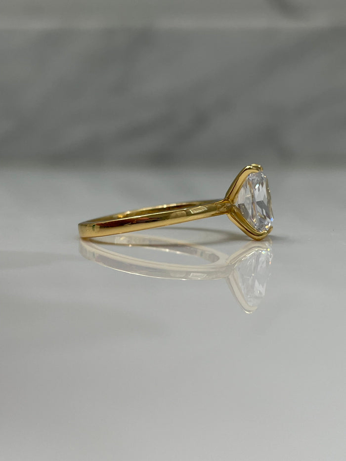 The Alessandra. 18K Yellow Gold Over Sterling Silver 925 Engagement Ring with the finest 2CT Radiant cut simulated diamond.