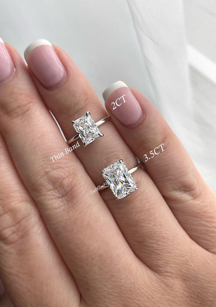 The Grace. Hidden halo. Sterling Silver 925 engagement ring with 2CT, 3CT radiant cut CZ simulated diamond and hidden halo.