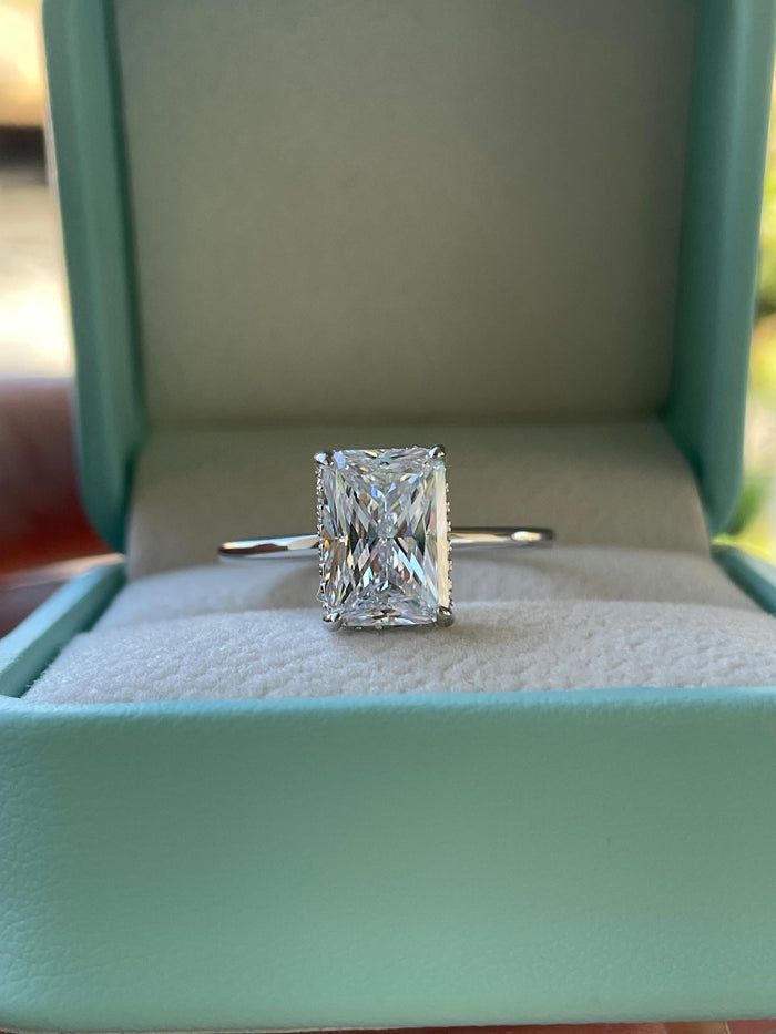 The Grace. Hidden halo. Sterling Silver 925 engagement ring with 2CT, 3CT radiant cut CZ simulated diamond and hidden halo.