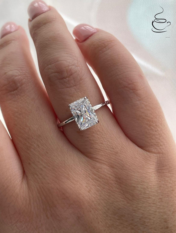 The Grace. Hidden halo. Sterling Silver 925 engagement ring with 2CT, 3CT radiant cut CZ simulated diamond and hidden halo.