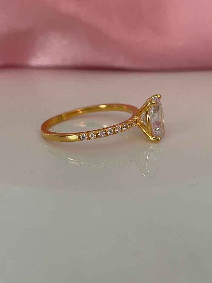 The Olivia. Yellow Gold Vermeil Engagement Ring with the finest 2CT oval cut simulated diamond
