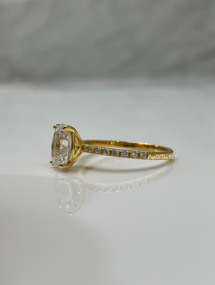 The Olivia. Yellow Gold Vermeil Engagement Ring with the finest 2CT oval cut simulated diamond