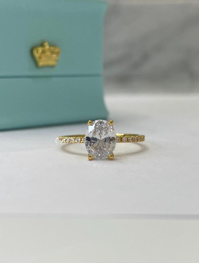 The Olivia. Yellow Gold Vermeil Engagement Ring with the finest 2CT oval cut simulated diamond