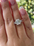 Three stone engagement ring with 3CT emerald cut CZ simulated diamond