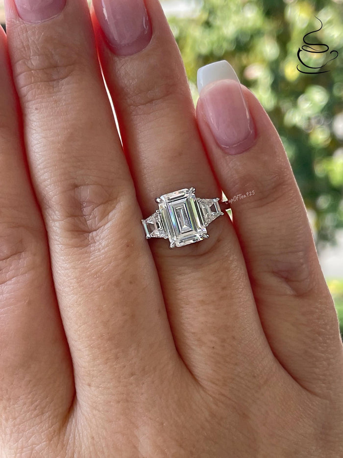 Three stone engagement ring with 3CT emerald cut CZ simulated diamond