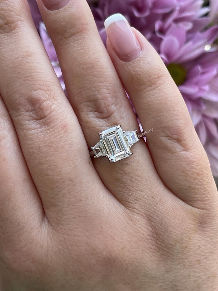 Three stone engagement ring with 3CT emerald cut CZ simulated diamond